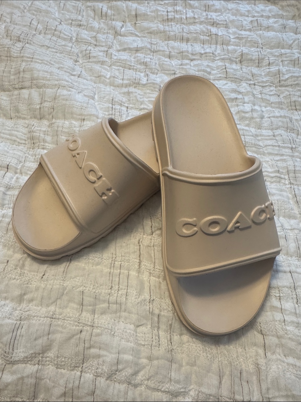 NEVER WORN Coach Embossed Logo Slide Sandals in Nude Beige